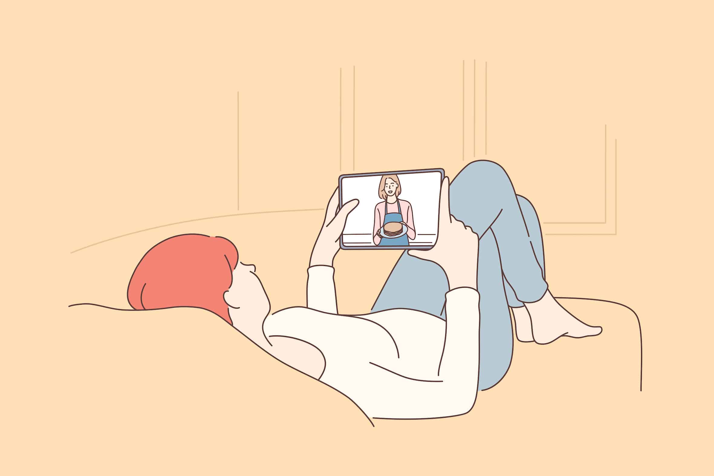 タブレットで料理動画コンテンツを視聴してリラックスする様子